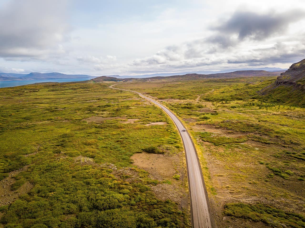 The open Ring Road winding through Icelandic scenery